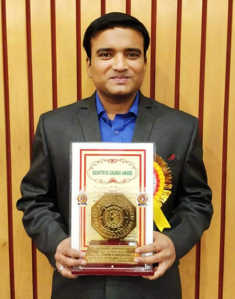 Fr Vineeth Cmf With Award